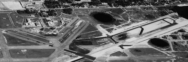 An old 1968 black and white aerial photo of McCoy Air Force Base. Airlines complete relocation to McCoy AFB, making ORL primarily a general and corporate aviation airport.