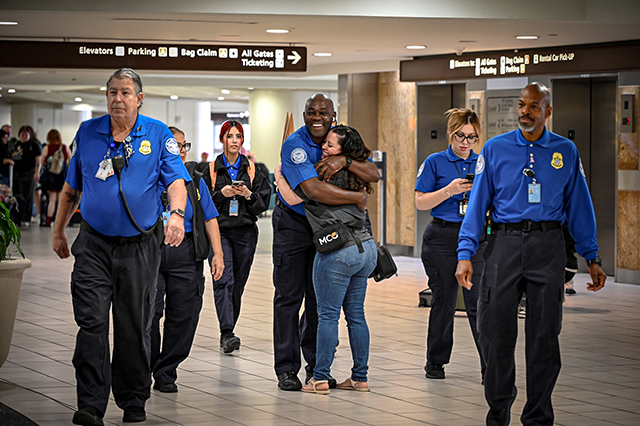 2025 Federal Airport Employee Appreciation Day group photo in hallway.