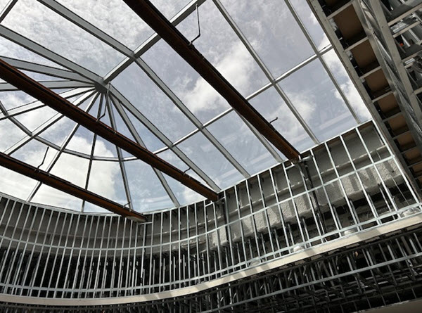 Looking up at the new Terminal C Pedestrian Bridge glass celling.