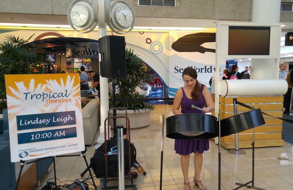 Lindsey Leigh January 2017 playing steels drums in a terminal at MCO.