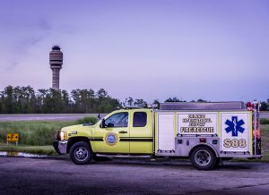 ARFF fire paramedics vehicle with GOAA tower in the background.