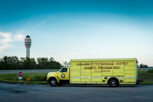 ARFF fire vehicle with GOAA tower in the background.