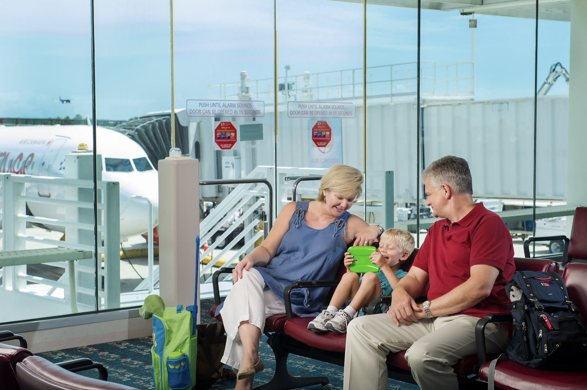 Family-waiting-for-plane-fa94a6