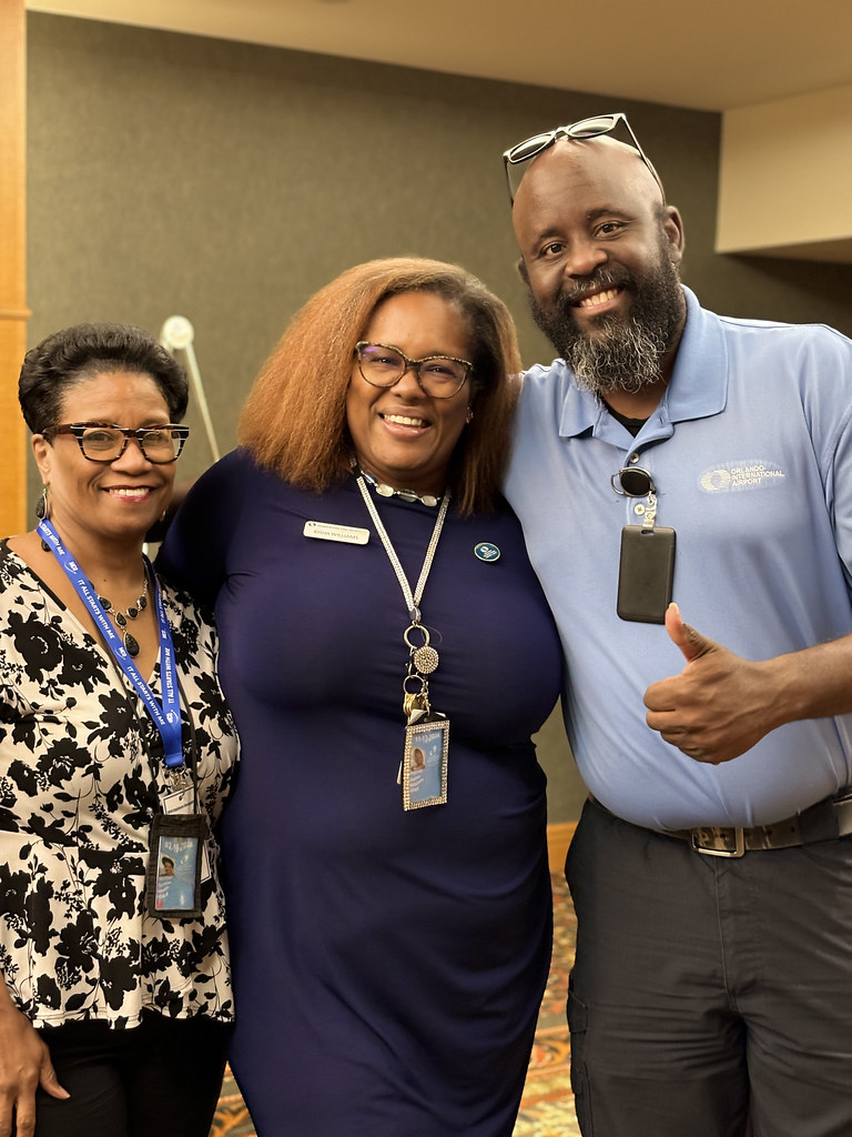 January 2024 Employee Recognition Brunch. Three GOAA employees stand side by side.