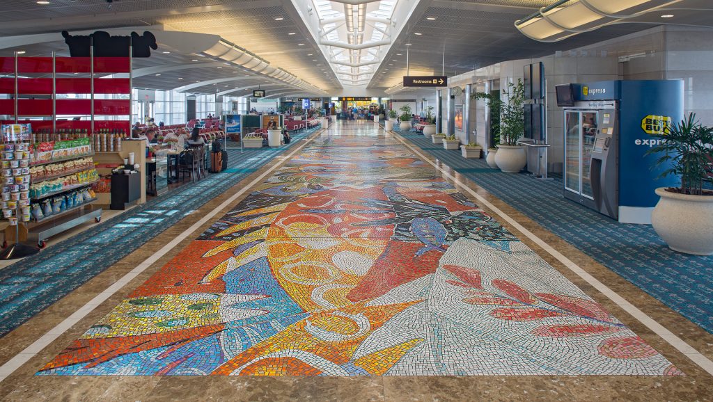 Artist: Victor Bokas
Details: 2000, 15 by 88 feet, Polished natural stone and vitreous ceramic
Collection: GOAA Art Collection
Location: Gates 100-109
