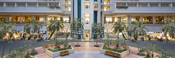 Inside the MCO Terminal AB looking at the front of the Hyatt Regency Orlando International Airport.