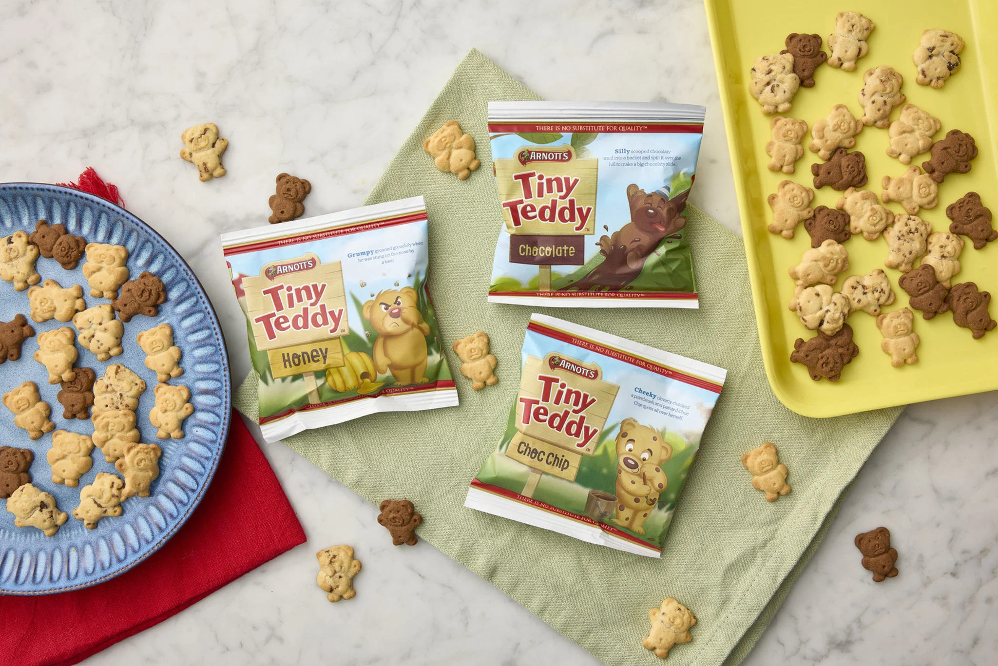 Image of Tiny Teddy Biscuits, with packs and loose biscuits