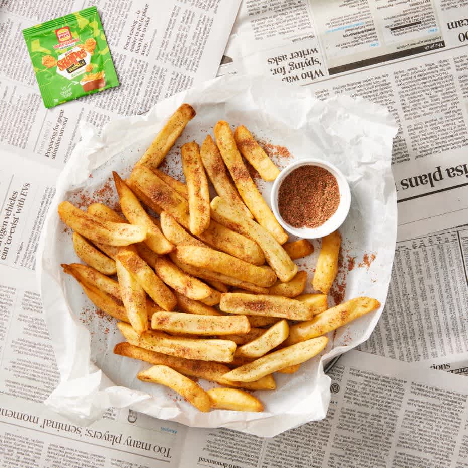 Picture of Hot Chips topped with delicious Arnott's barbecue Shapes Flavour Shaker Seasoning