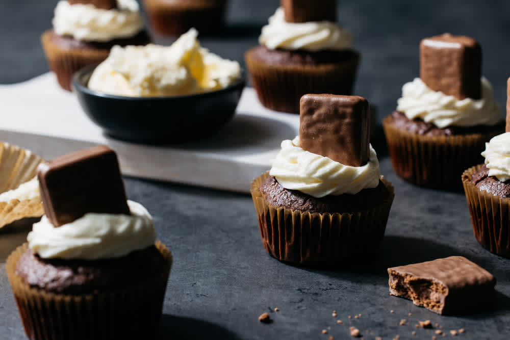 Image of Arnott's Chewy Caramel Cupcakes, featuring Tim Tam Biscuits
