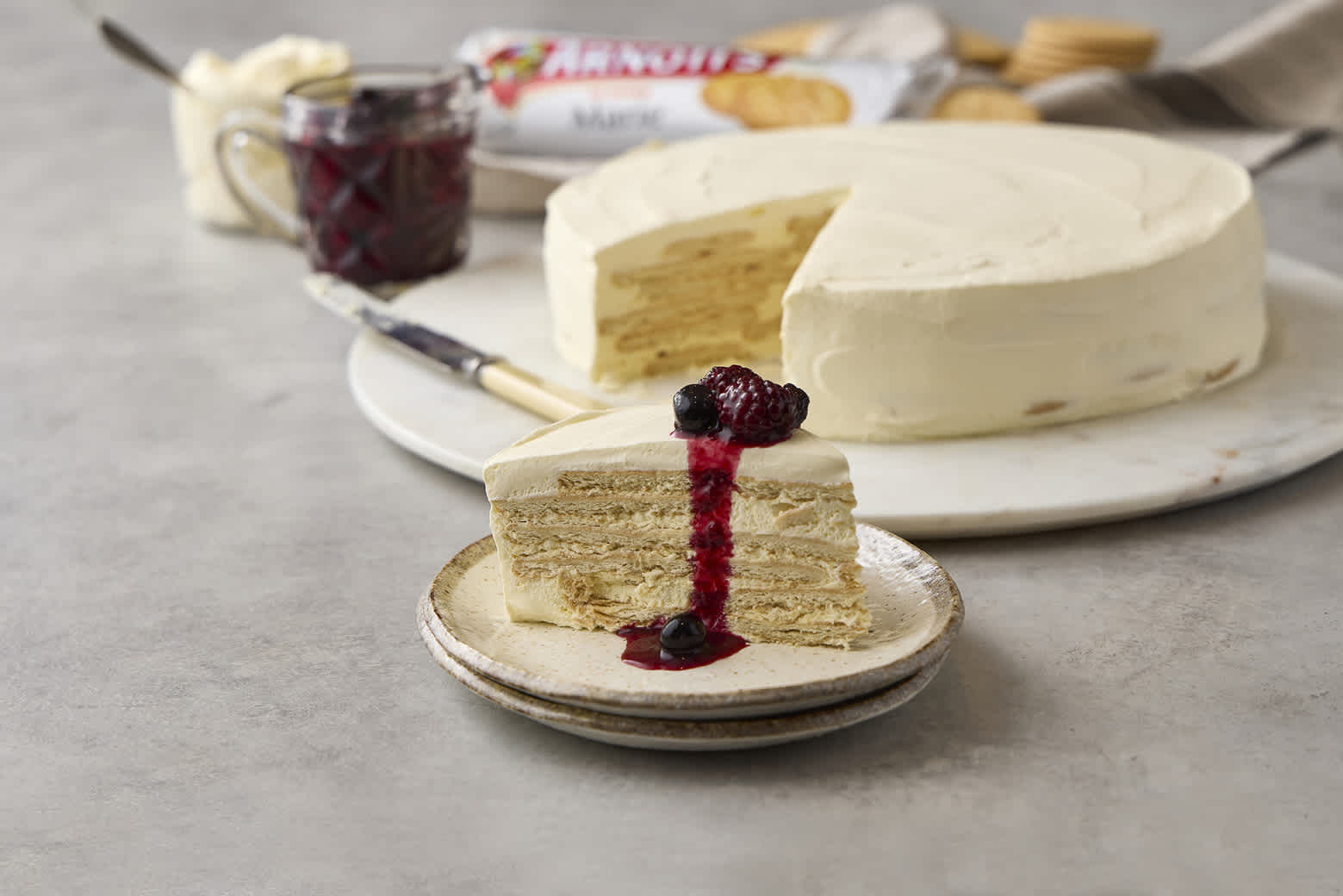 Picture of Arnott's Marie Cake, served with berry compote, pictured with Arnott's Marie Biscuits