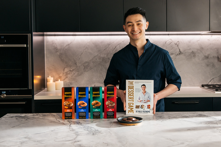 Image of Reynold Poernomo with Arnott's Obsession biscuits