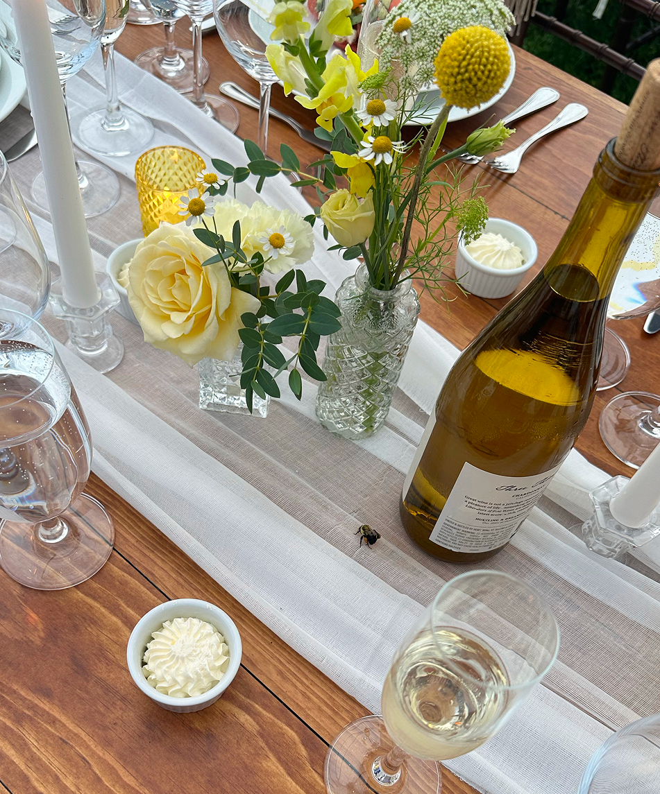 a table setting at a wooden table