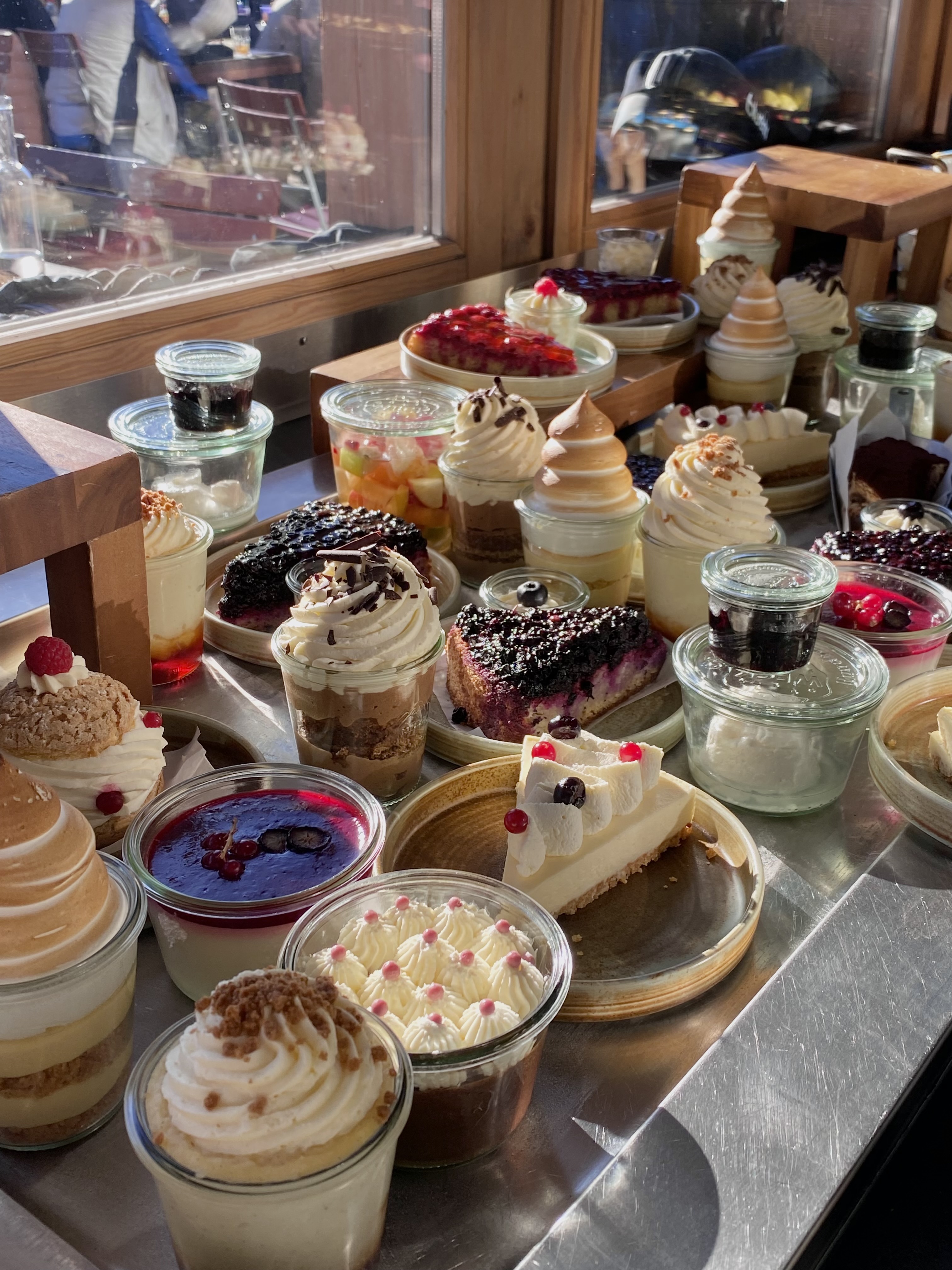 a table of various different types of desserts