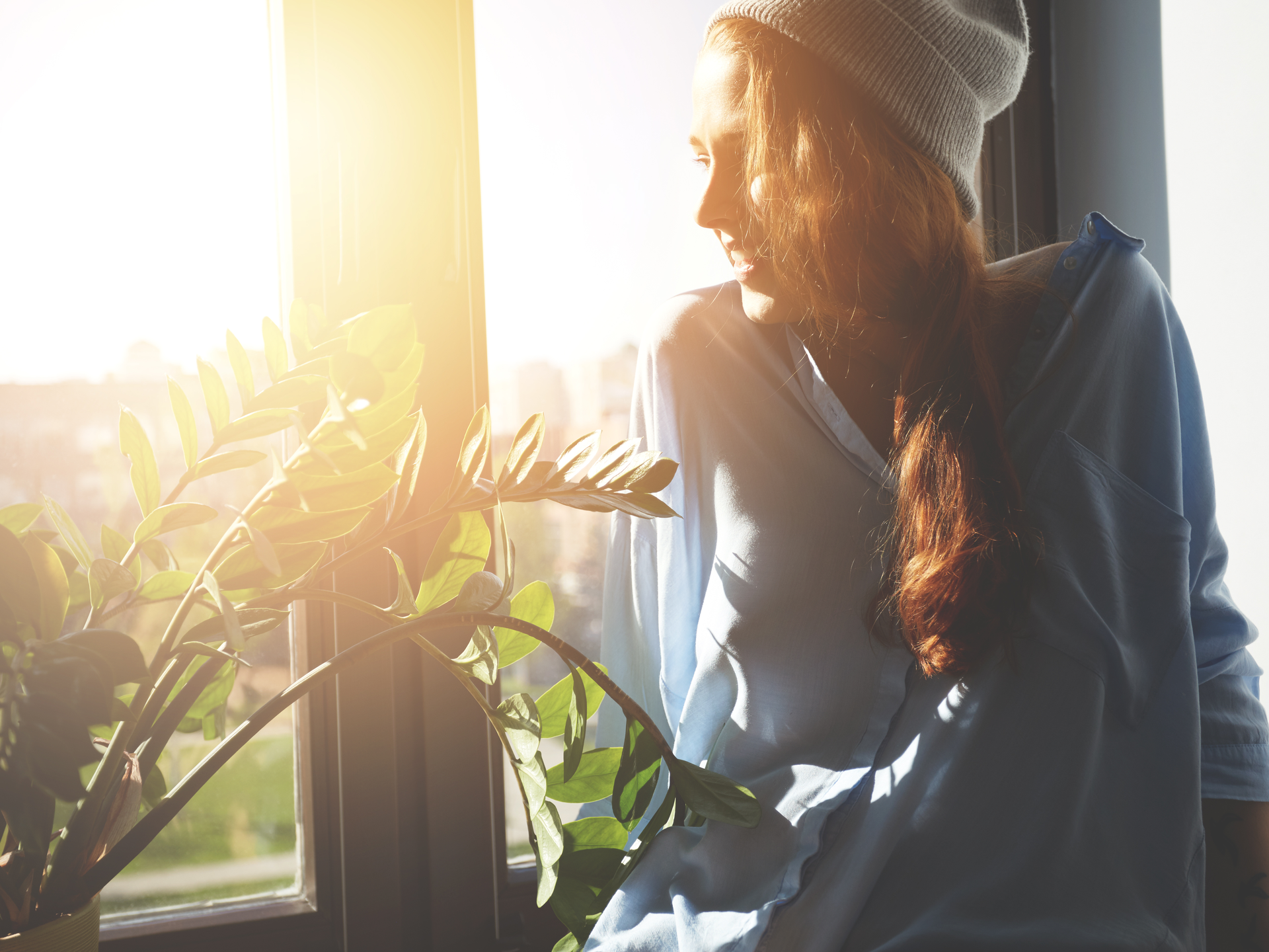 girl at window in sunlight