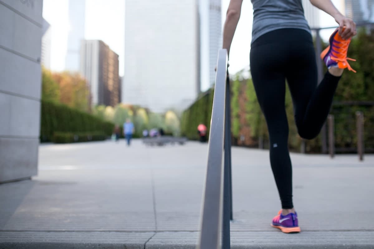 woman stretching outside