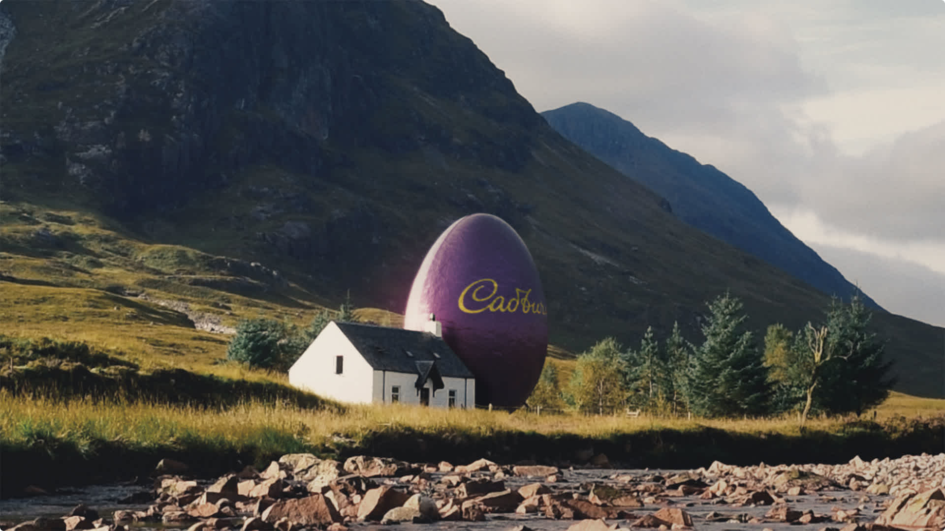 Giant egg behind a house in the countryside