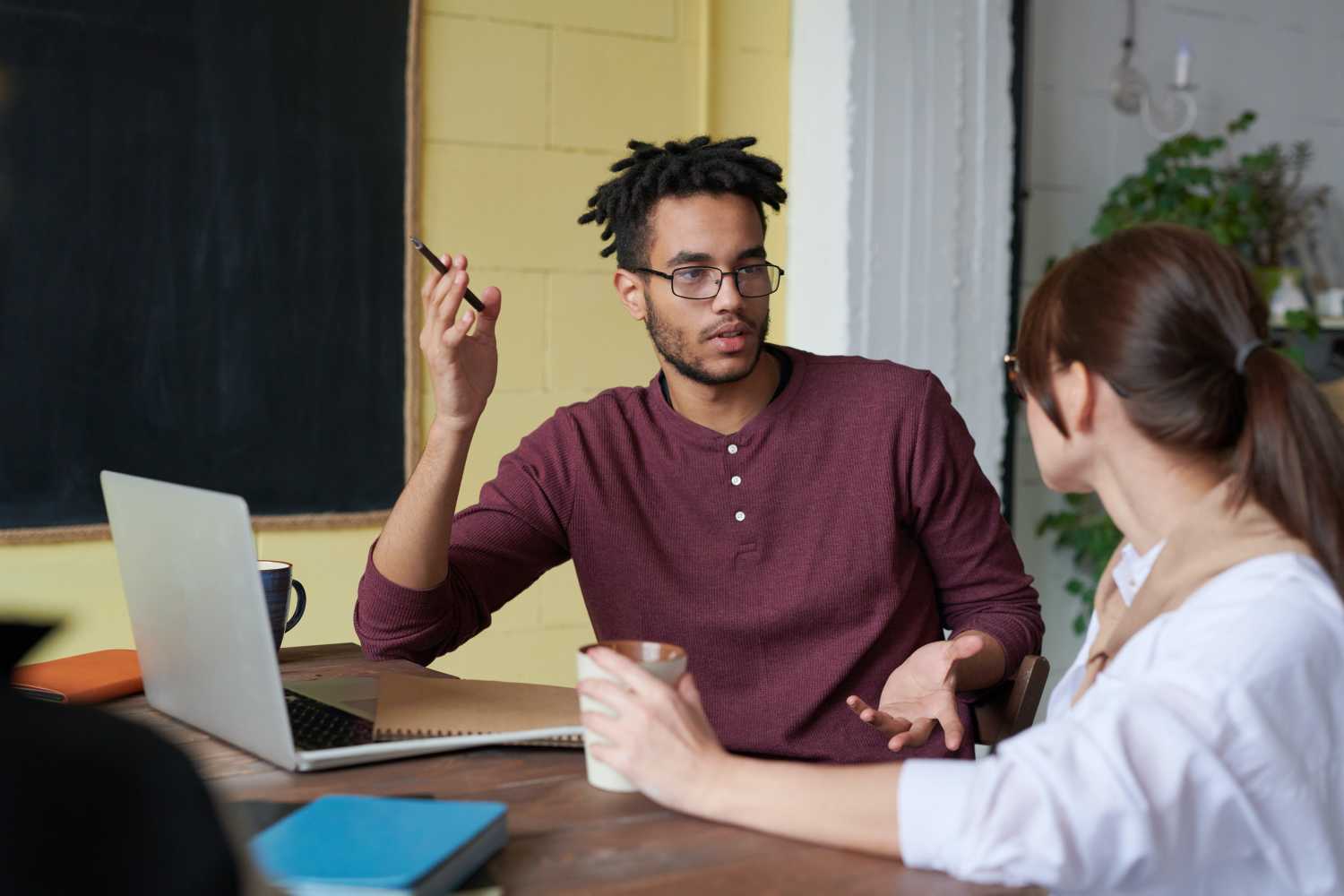 Designer talking to a customer about their needs