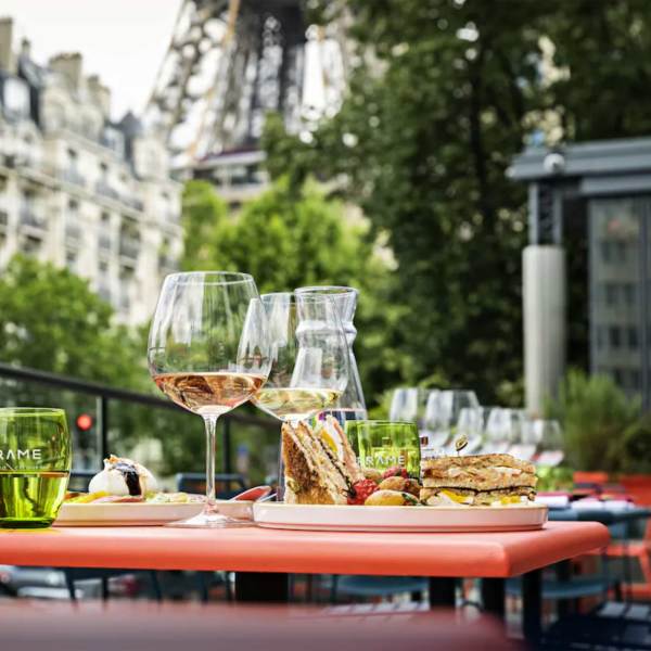 Outdoor dining with a view of the Eiffel Tower