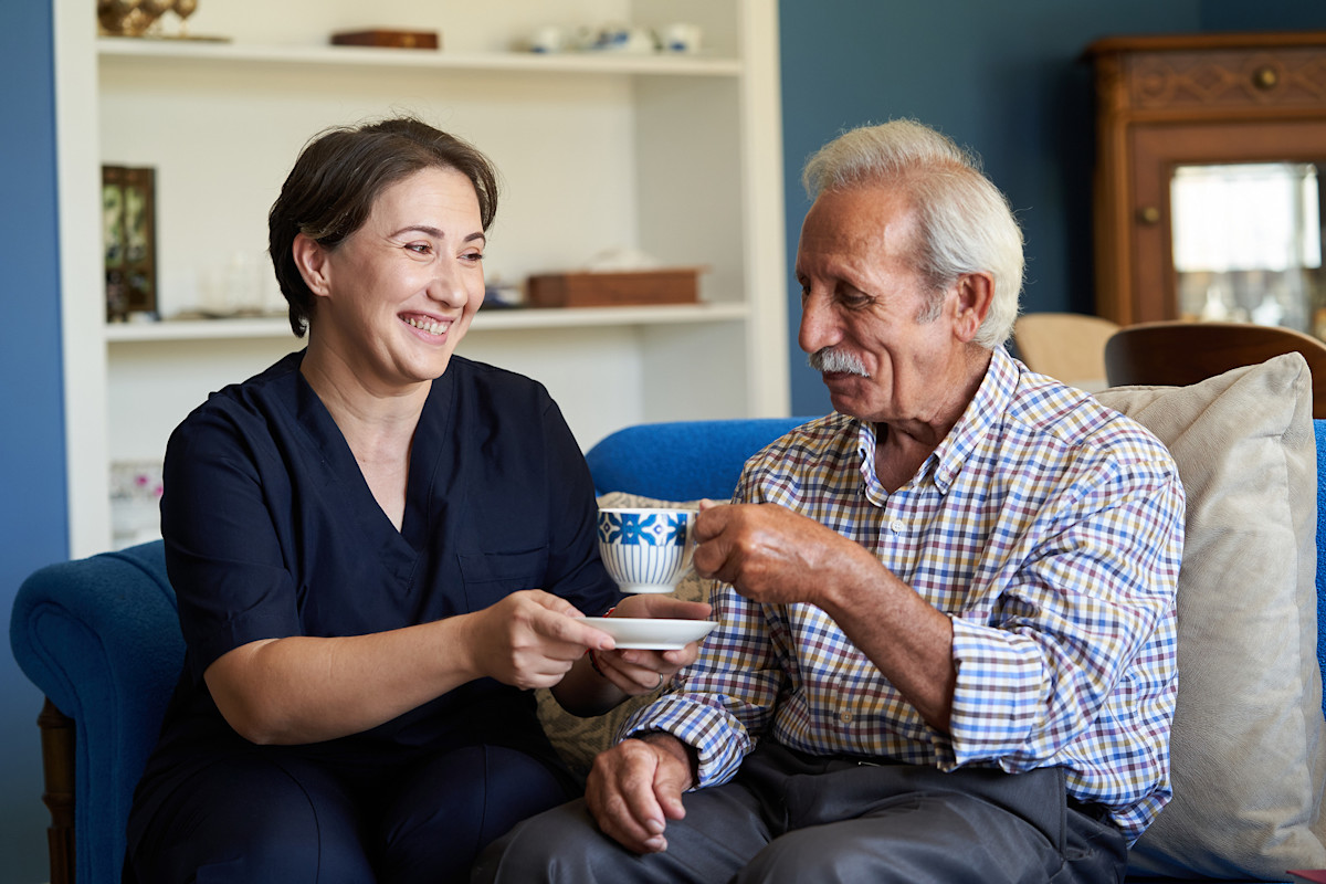 Two people smiling