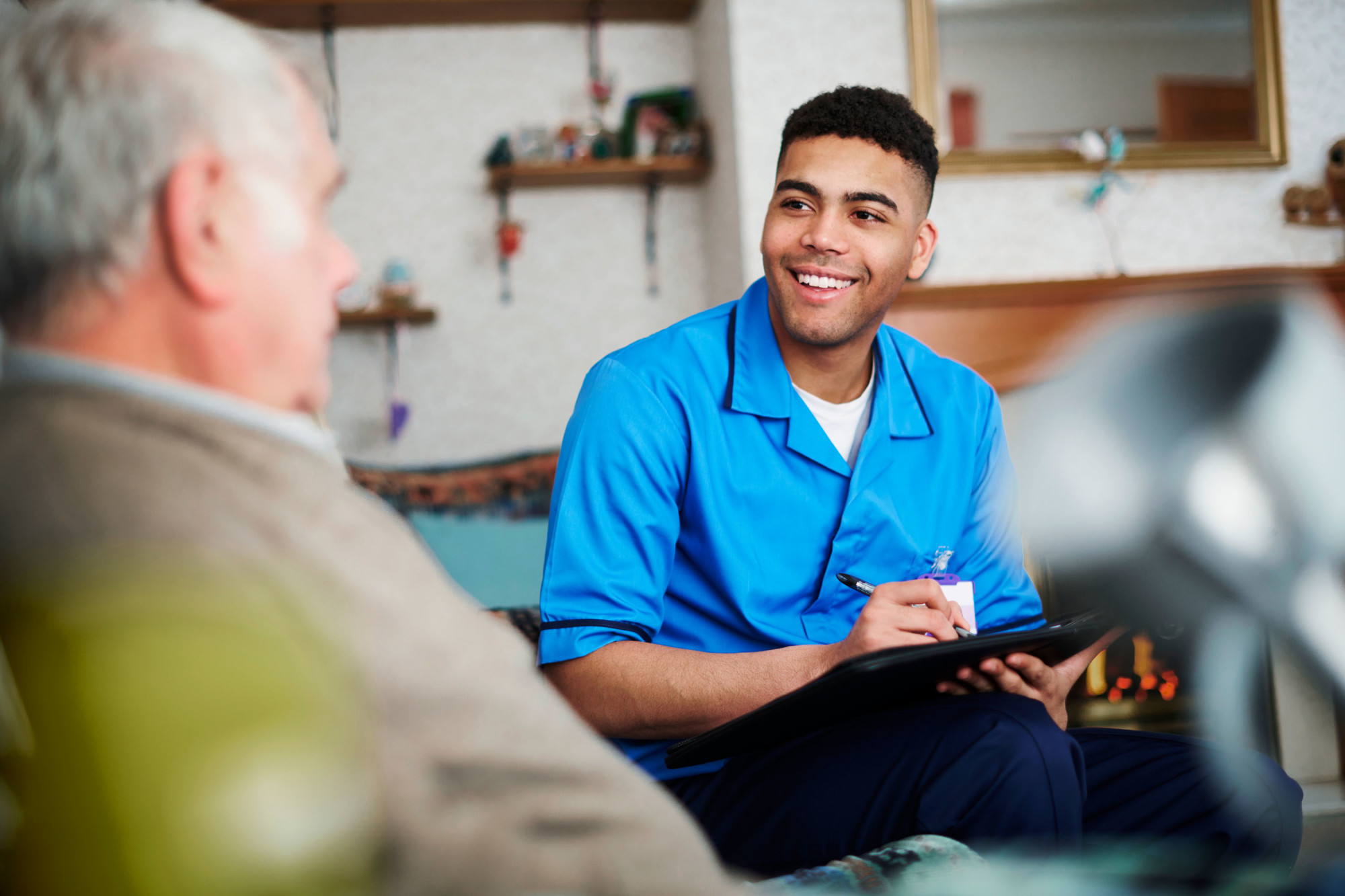 A nurse talking with a patient