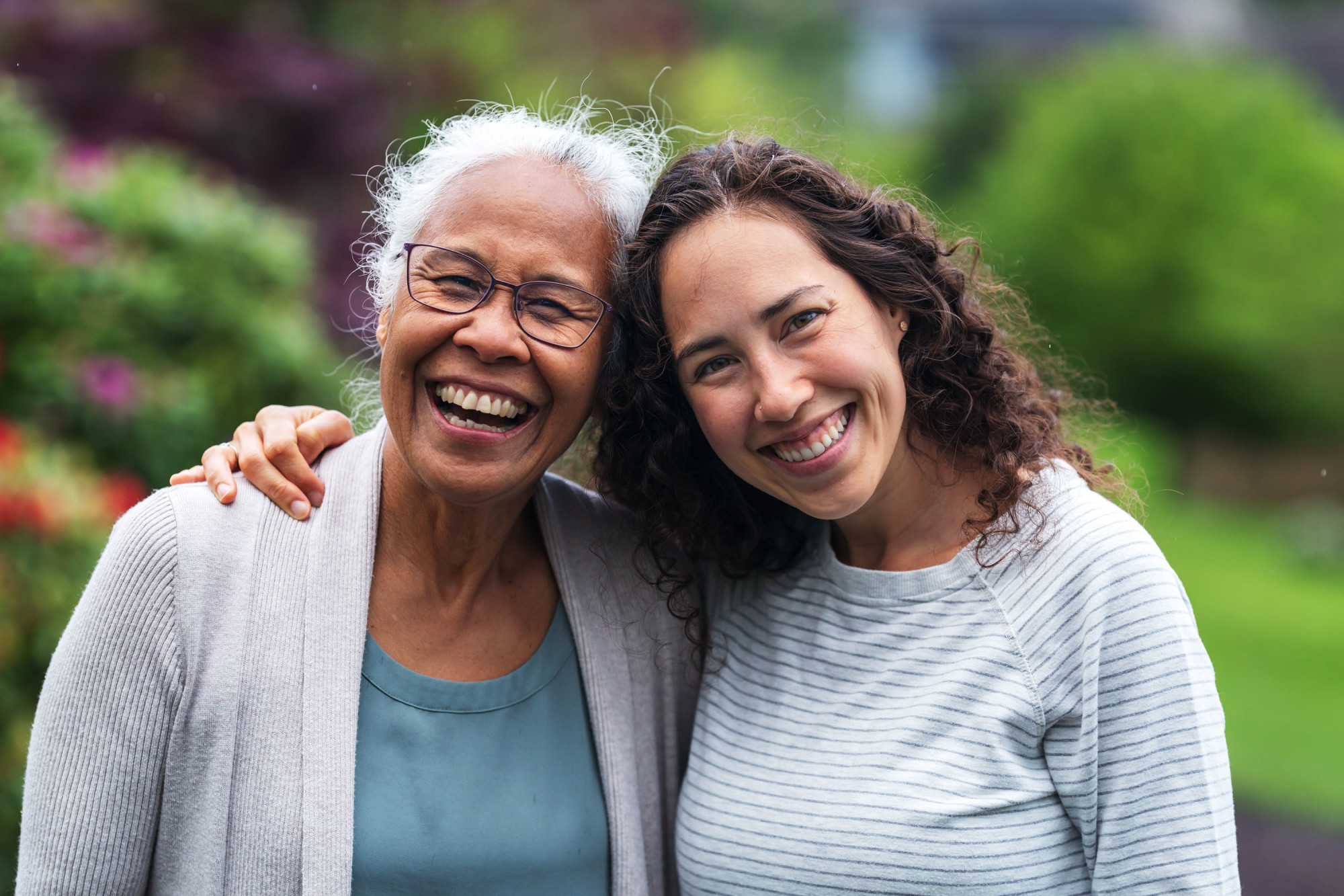 Two women smiling together