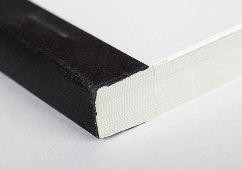Cuaderno autocopiativo grapado de lona negra