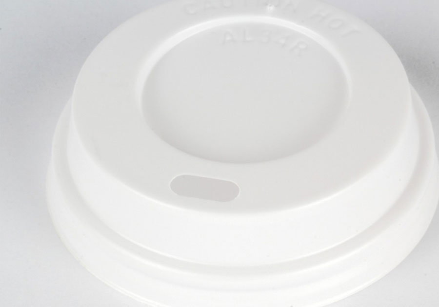 Couvercle en plastique blanc avec orifice