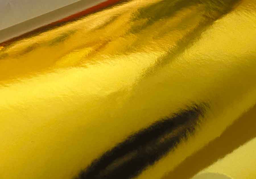 Etiqueta en rollo, aplicación manual, papel dorado