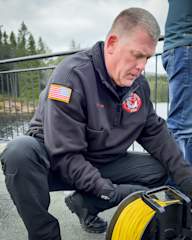 Captain Adam Stewart med tjorsnellen ved Baklidammen