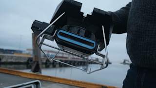 Multibeam skid held up by operator