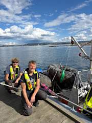 Marinreparatørene – crew with recovered tire, Inner Oslofjord