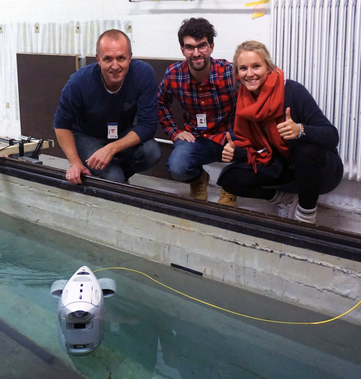 Erik, Borja and Christine with first Blueye prototype in the water