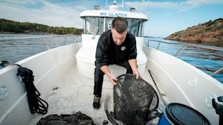 Arild Karlsen aboard MS Gläpen with recovered fishing gear