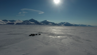 Team preparing hole in the ice