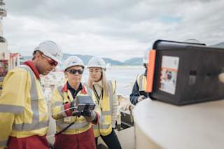 Archie Nicholson with Blueye team