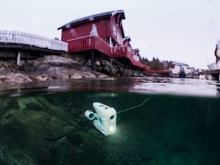 Exploring from the floating harbour of Kvenvær