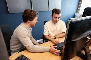 Aglim and Embret working on the Blunux web app