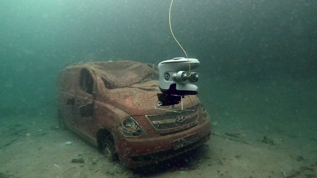 Photo of Blueye X3 inspecting the car dumped underwater in an online demonstration.