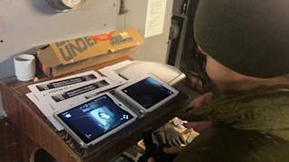 Soldier controlling the Blueye inside a torpedo chamber