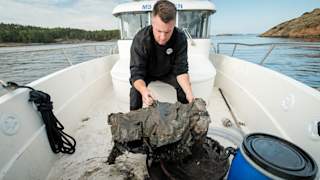 Arild Karlsen examines recovered fishing gear