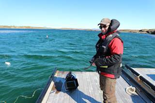 Steffen diving from a small pier at Vega