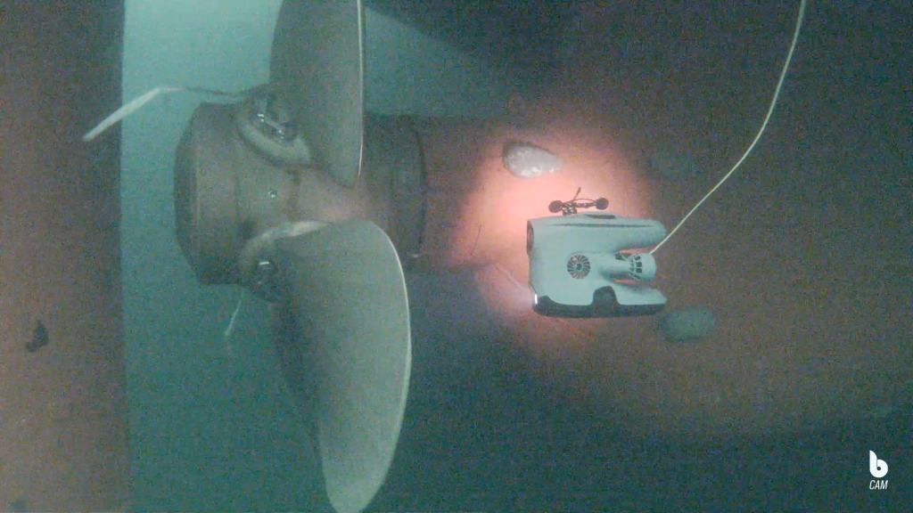 The Blueye drone inspecting a propeller on a vessel.