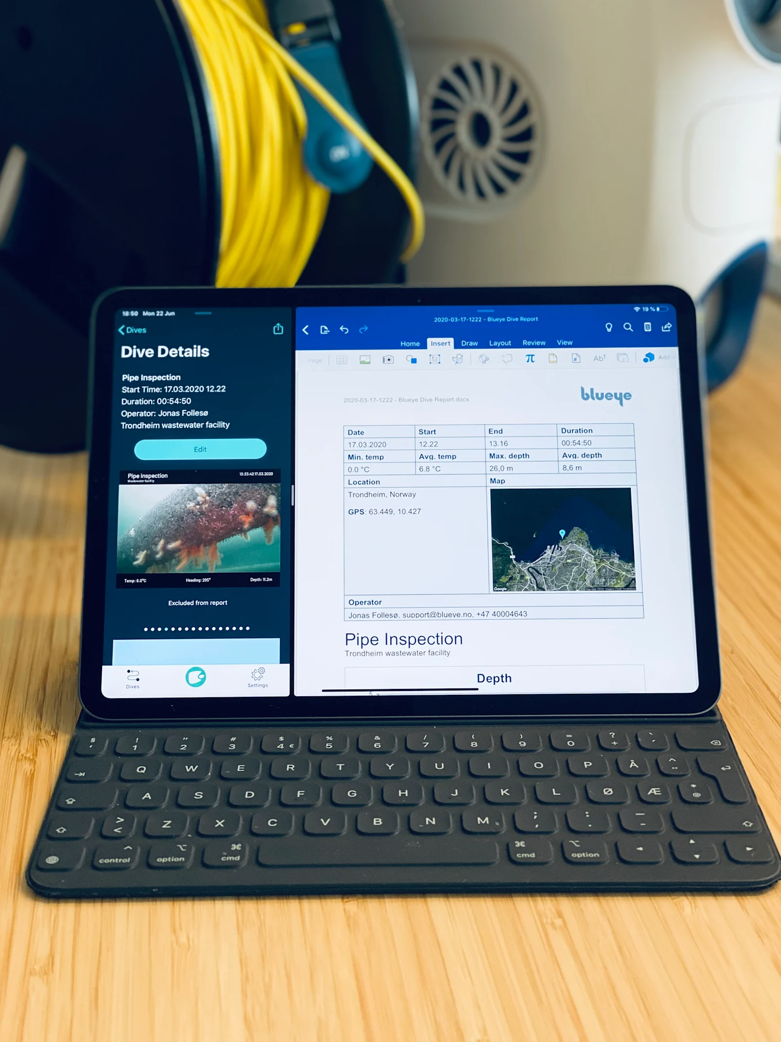 Blueye appen og Microsoft Word side om side på en iPad Pro.