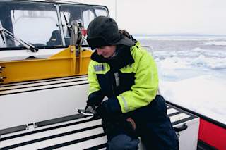 Research member piloting the drone