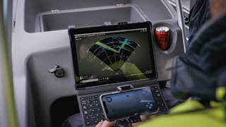 ROV pilot from boat looking at multibeam sonar imagery