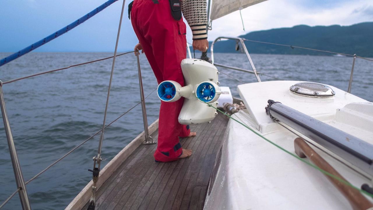 Co-Founder & VP Marketing Christine getting ready to launch the drone from her sailboat