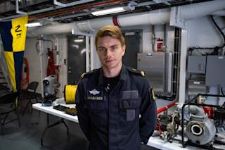 Erik Johansen from KV Bjørnøya posing inside at the heli deck