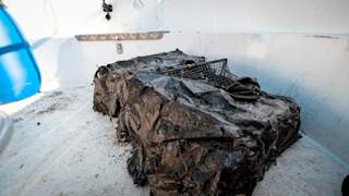 Mud-caked fishing gear recovered from the Oslofjord