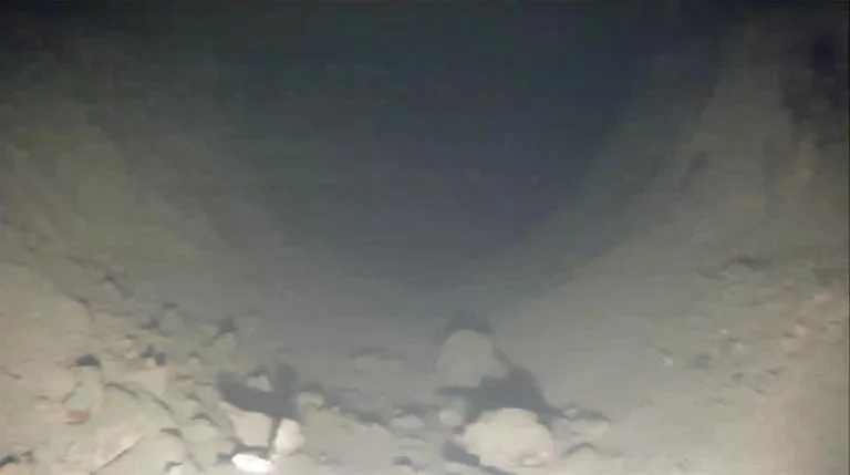 In the middle of the bigger room, there are some loose stones that probably have fallen down from the roof.