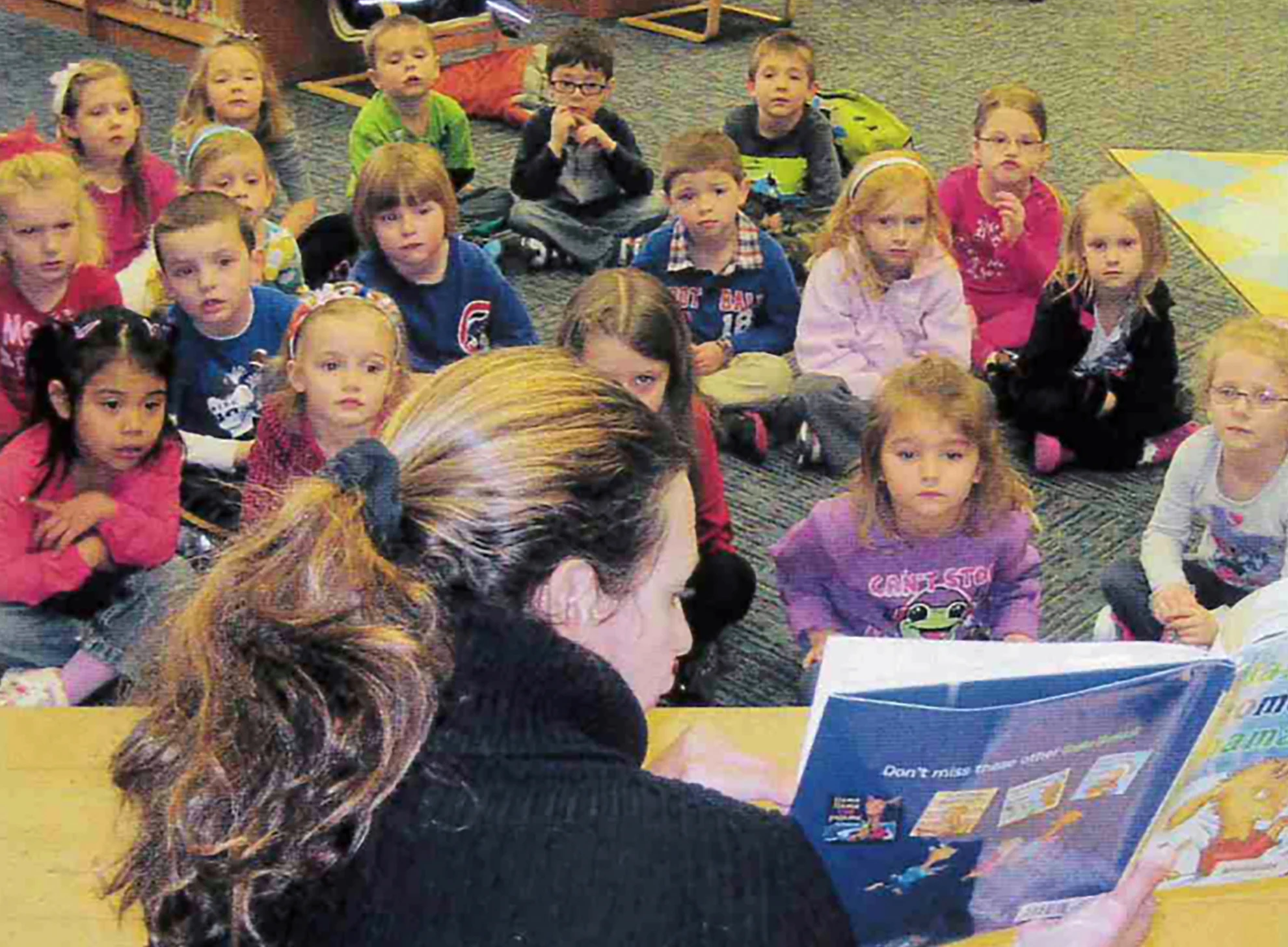 Heather Trees reading to students